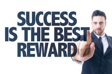 Business man pointing the text: Success is the Best Reward