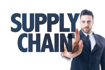 Business man pointing the text: Supply Chain