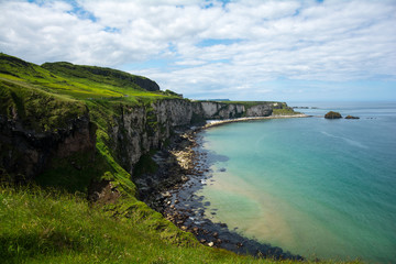 Fototapeta na wymiar Coastline and cliff at carrick a rede in Northern Ireland