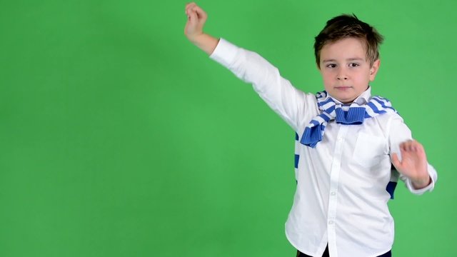 young handsome child boy stretch - green screen - studio