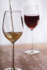 Wine gets filled into a glass