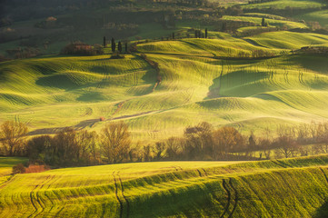 Fototapeta premium Beautiful Tuscan landscape with long shadows and mists