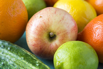 Assorted fruits and cucumber.