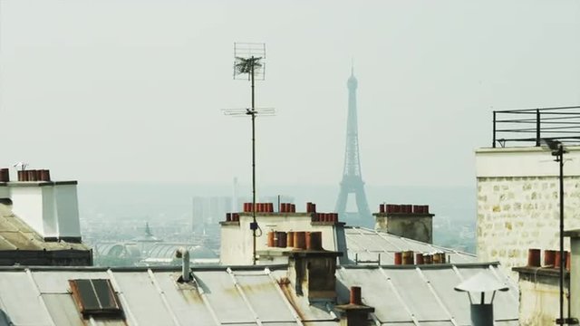 WS HA LS Eiffel Tower over rooftops / Montmartre, Paris, France