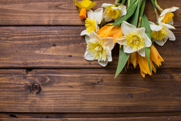 Background with fresh daffodils and tulips