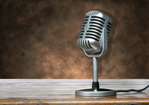 Classic Microphone on brown grunge texture