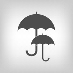 Two grey umbrellas as logo