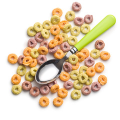 Fototapeta na wymiar colorful cereal rings and spoon