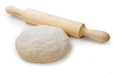 fresh dough and rolling pin isolated