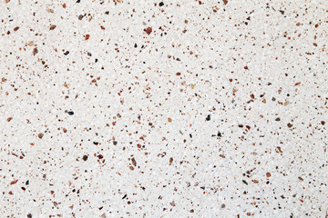 Fototapeta na wymiar pebbles on a white wall, background