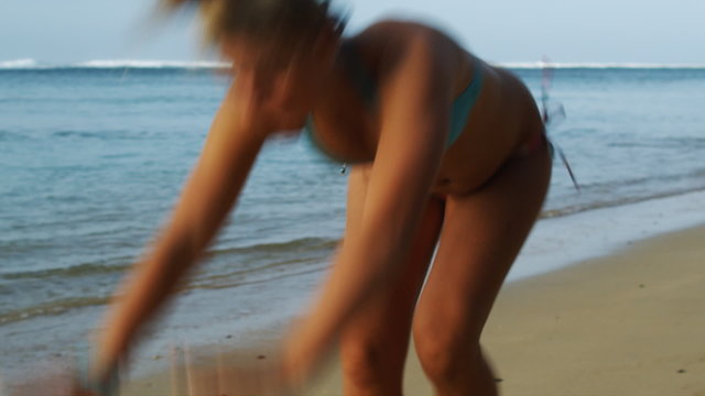 young woman doing back flips