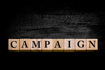 Word CAMPAIGN isolated on black background