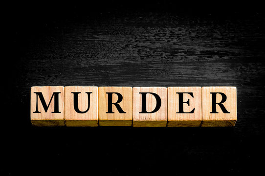 Word MURDER isolated on black background