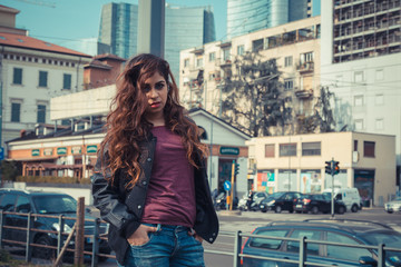 Beautiful girl posing in an urban context