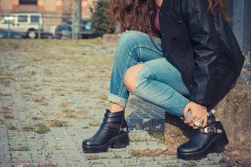Beautiful girl posing in an urban context