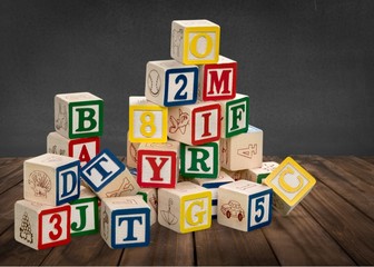 Toy. Wooden toy cubes with letters. Wooden alphabet blocks.