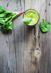 Fototapeta na wymiar vitamin fresh, green smoothie with spinach, banana in a glass