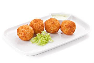 Deep fried cheese balls with  lettuce and white sauce