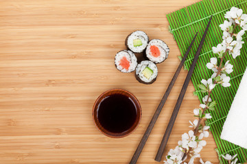 Sushi maki set with fresh sakura branch © evgeeenius