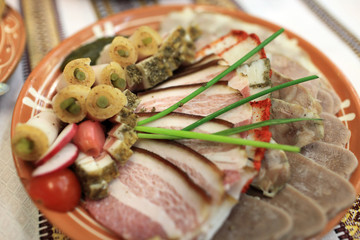 Slices of various bacon