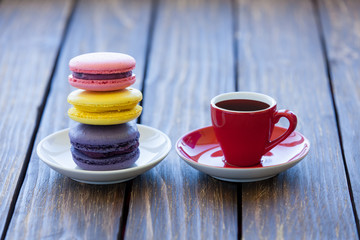Cup of coffee and macarons