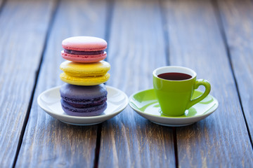 Cup of coffee and macarons