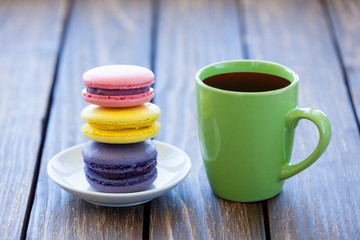 Cup of coffee and macarons