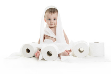Toddler ripping up toilet paper in bathroom studio
