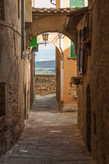 Fototapeta na wymiar Narrow and winding streets of the small town of Tuscany, Montepu