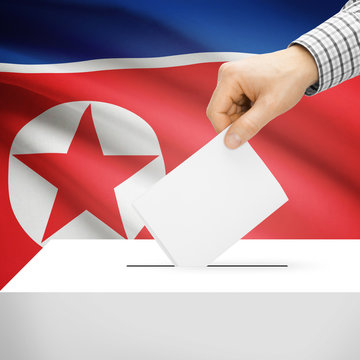 Ballot box with national flag on background - North Korea