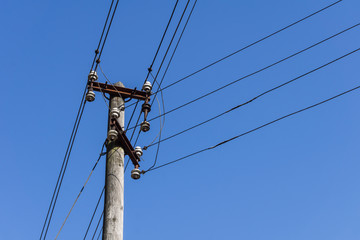 Wooden electric pole with wires