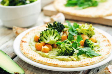 vegan tortilla with roasted broccoli and chickpeas and avocado s