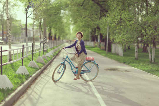 girl on a bicycle spring morning