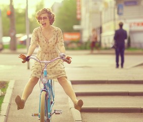 girl on a bicycle spring morning