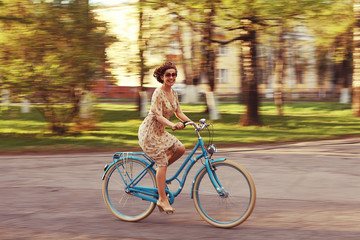 girl on a bicycle spring morning