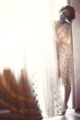 Vintage sepia portrait of a girl hipster concept