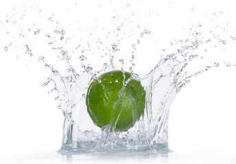 Limes with water splash