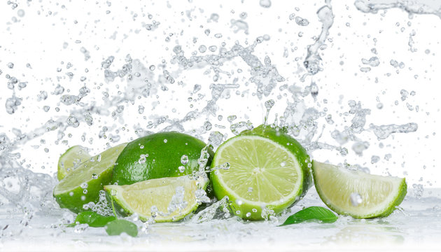 Limes with water splash