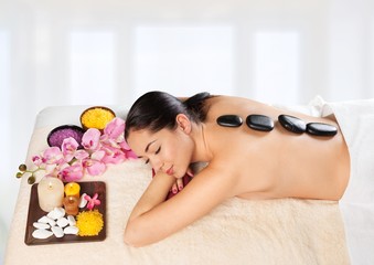 Obraz na płótnie Canvas Spa. Beautiful young woman getting spa massage
