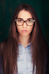 Fototapeta premium Close-up portrait of beautiful woman in glasses