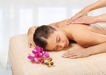 Obraz na płótnie Canvas Spa. Picture of woman in spa salon lying on the massage desk