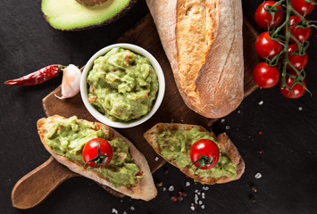 Guacamole with bread and avocado