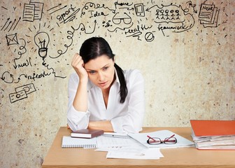 Fototapeta premium Women. Disappointed mature businessswoman thinking over
