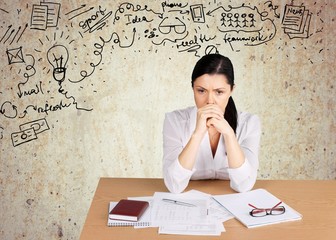 Fototapeta premium Women. Disappointed mature businessswoman thinking over