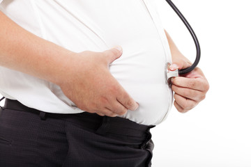 fat Man  holding stethoscope for medical exam concept