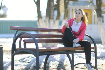 young athletic girl on a walk in the park