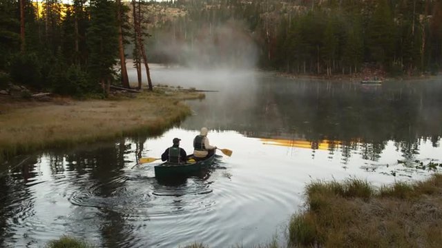 WS HA Two people rowing in kayak on lake, Uinta Mountains, Utah, USA