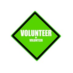 Obraz premium Volunteer white stamp text on green background