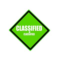 Classified white stamp text on green background