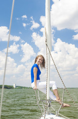 Travelling Concepts: Sensual Caucasian Woman Sailing on Yacht Ou